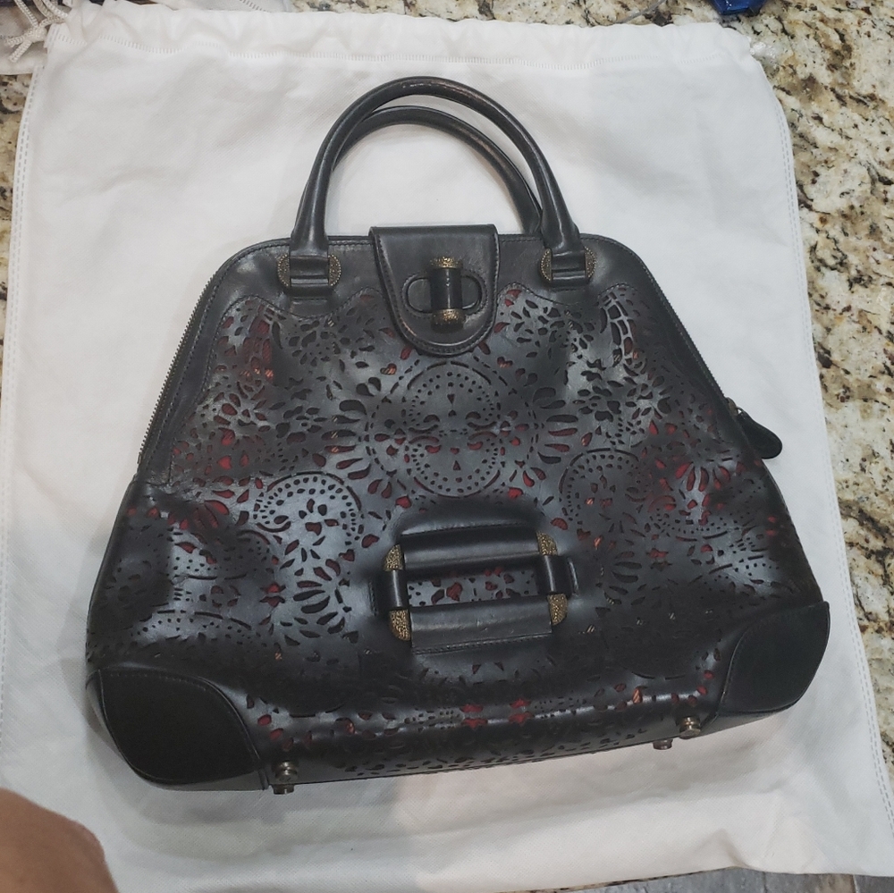 Alexander McQueen Elegant Black and Red Laser-Cut Handbag